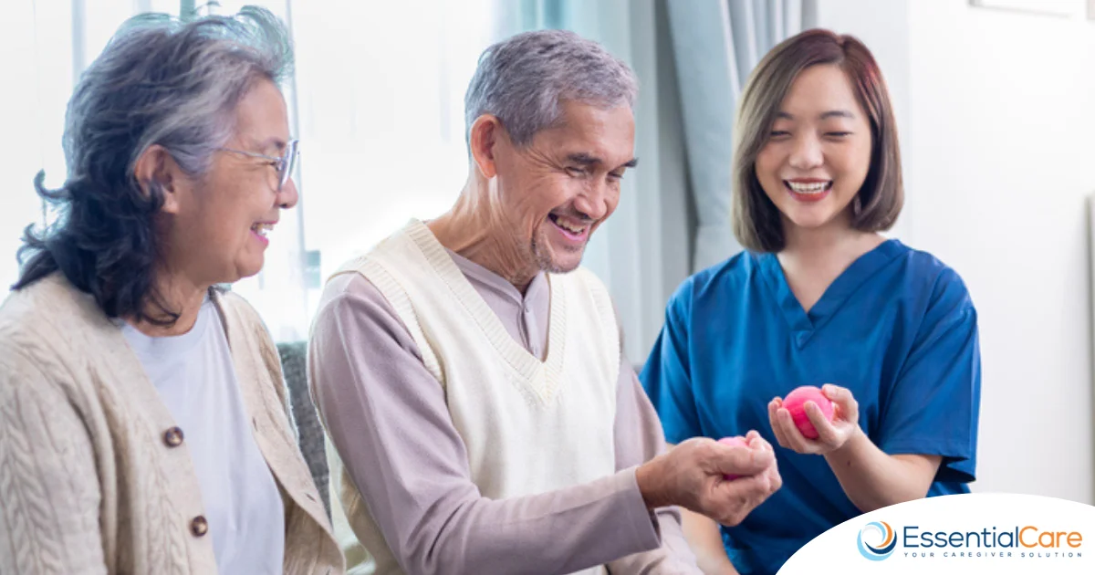 Caregiver assisting senior with hand exercises to ease arthritis discomfort at home