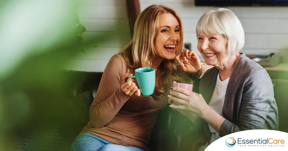 Caregiver and senior sharing a warm conversation over coffee, representing building trust through communication in home care
